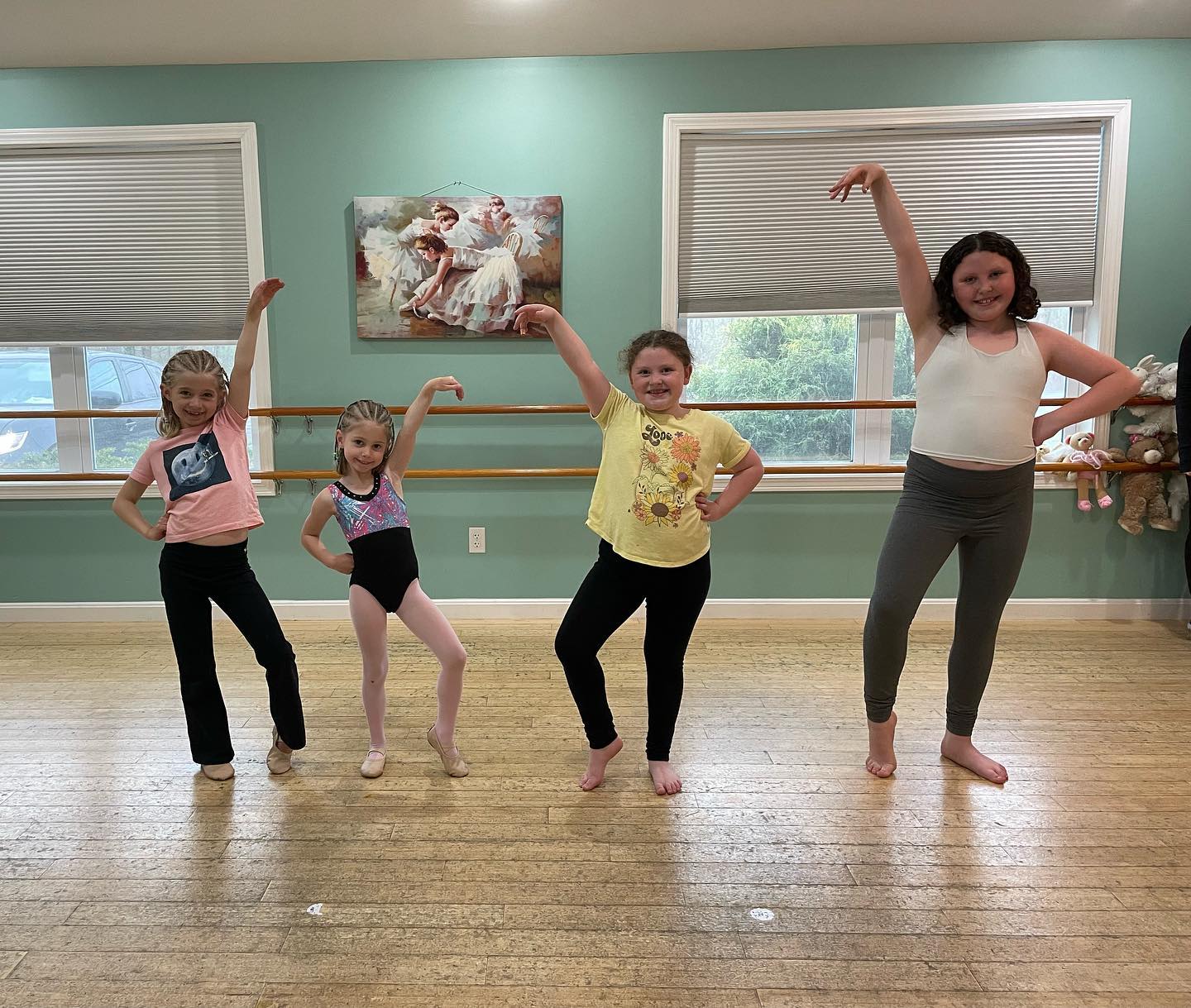 Four L.A. Dance students striking their own jazz poses in class